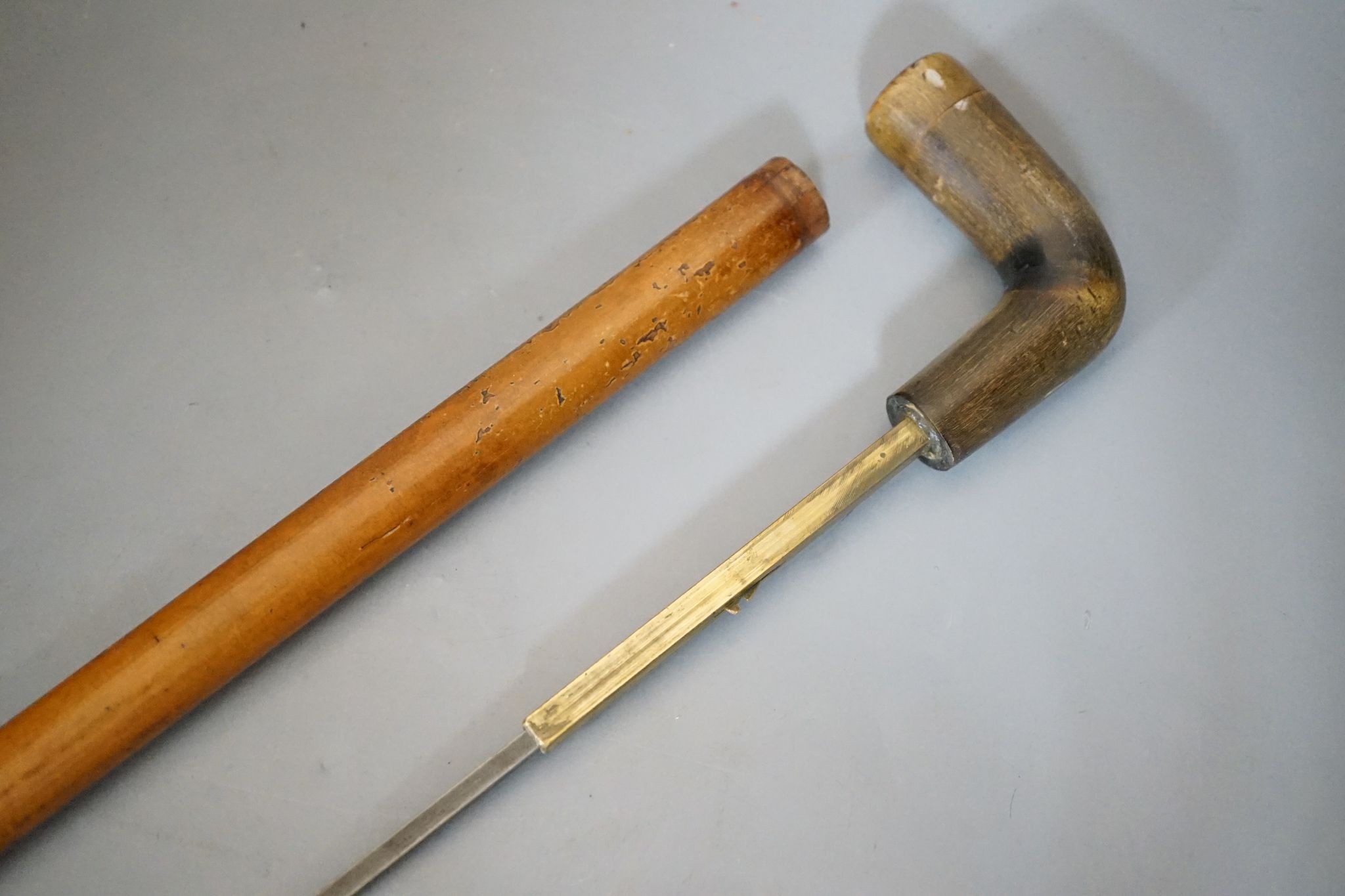 A horn-handled sword-stick, the end of the handle with unscrew-able section, circa 1900